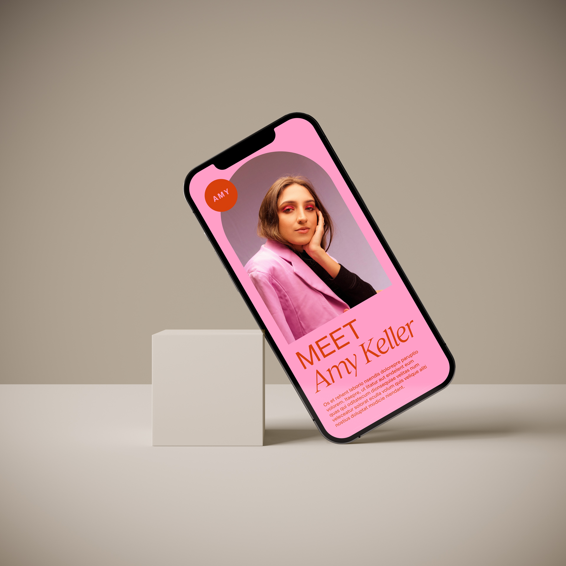 an iPhone leaning against block, showing a screenshot of a pink Flodesk form